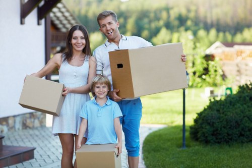 Packed boxes and furniture ready for storage in Hornchurch