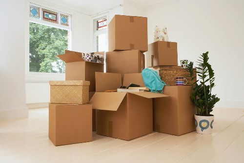 Professional movers loading items during a Hornchurch small removal